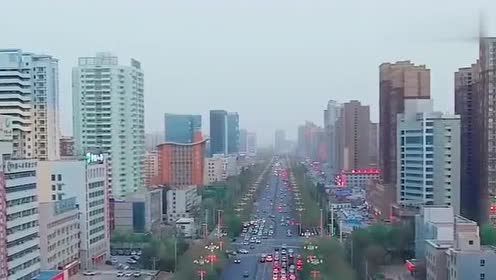 新疆第二大城市库尔勒:因盛产水果香梨又称"梨城",市容美如画