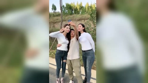 三人合影美女一个小动作,情侣就闹矛盾,拍张照都能挑拨的情侣还能处吗