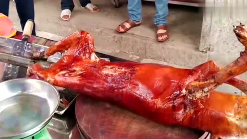 越南特色"烤乳狗",一眼下去差点看错,神似烤乳猪