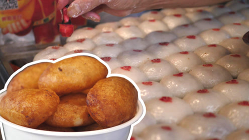 石狮夫妇在城隍庙做煎粿,老灶老锅几十年,生意红火几十年